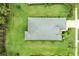 Overhead view of a well-maintained home with a neatly landscaped yard and visible roof details at 4654 Claremont Park Dr, Bradenton, FL 34211