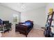 Bedroom featuring carpet, single bed, desk and ceiling fan at 4654 Claremont Park Dr, Bradenton, FL 34211