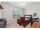 Cozy bedroom with a ceiling fan, large window, and a comfortable bed at 4654 Claremont Park Dr, Bradenton, FL 34211