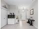 Bright foyer with neutral walls, tile flooring, and an aquarium, creating a welcoming atmosphere at 4654 Claremont Park Dr, Bradenton, FL 34211
