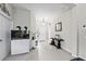 Bright foyer with neutral walls, tile flooring, and an aquarium, creating a welcoming atmosphere at 4654 Claremont Park Dr, Bradenton, FL 34211
