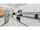 Stylish kitchen with white cabinetry, granite countertops, and stainless steel appliances at 4654 Claremont Park Dr, Bradenton, FL 34211