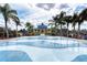 Interactive splash pad with colorful wave design and a charming gazebo, perfect for Gathering fun and recreation at 4654 Claremont Park Dr, Bradenton, FL 34211