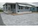 Charming single-story home with a brick paver drive and sidewalk at 5112 Glen Echo Ave, Sarasota, FL 34234