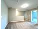 Upstairs loft area with carpeted flooring and access to other rooms at 5812 Ocean Isle Dr, Nokomis, FL 34275