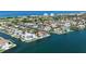 Aerial view showcasing the waterfront property's premium positioning and access to the surrounding neighborhood at 585 Gunwale Ln, Longboat Key, FL 34228