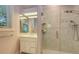 Bathroom featuring a glass shower and vanity at 585 Gunwale Ln, Longboat Key, FL 34228