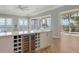 Wet bar and serving area with ocean views offer the perfect blend of functionality and luxury at 585 Gunwale Ln, Longboat Key, FL 34228