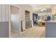 Bright bathroom featuring a glass shower, double vanity, and a view into the bedroom at 585 Gunwale Ln, Longboat Key, FL 34228
