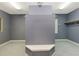 Spacious walk-in closet with wall-to-wall blue walls and lighting at 585 Gunwale Ln, Longboat Key, FL 34228