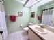 Bathroom with white countertop and tile flooring at 6505 Stone River Rd # 309, Bradenton, FL 34203