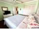 The bright bedroom has an open closet for storage space at 6505 Stone River Rd # 309, Bradenton, FL 34203
