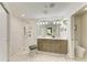 Bright bathroom with double vanity, a glass shower, and modern finishes at 6536 Moorings Point Cir # 101, Lakewood Ranch, FL 34202