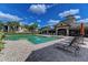Inviting community pool and clubhouse with lounge chairs, perfect for relaxation and community gatherings at 6536 Moorings Point Cir # 101, Lakewood Ranch, FL 34202