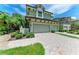 A charming two-story home with a two-car garage and a brick driveway at 6536 Moorings Point Cir # 101, Lakewood Ranch, FL 34202