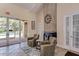 Elegant lobby area with comfortable seating, fireplace, and access to the pool area at 6536 Moorings Point Cir # 101, Lakewood Ranch, FL 34202