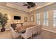 Well-lit meeting room with a large conference table, comfortable chairs, and a TV for presentations at 6536 Moorings Point Cir # 101, Lakewood Ranch, FL 34202
