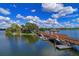 Picturesque pier extending into the lake, featuring a gazebo and boat docks for residents' enjoyment at 6536 Moorings Point Cir # 101, Lakewood Ranch, FL 34202