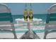 Relaxing beach view with beach chairs and beers overlooking the ocean at 701 Marbury Lane, Longboat Key, FL 34228