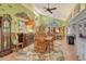 Open-concept dining area with lots of natural light and charming decor at 701 Marbury Lane, Longboat Key, FL 34228