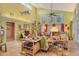 Bright and airy living area with vaulted ceiling, multiple windows, and comfortable seating at 701 Marbury Lane, Longboat Key, FL 34228