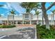 Exterior of a Publix grocery store with palm trees and ample parking in a sunny location at 701 Marbury Lane, Longboat Key, FL 34228