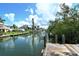 Picturesque waterfront view highlighting the canal and surrounding residential properties at 701 Marbury Lane, Longboat Key, FL 34228