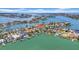 Stunning aerial view of waterfront homes with private docks and beautiful bay views at 8001 13Th S Ave, St Petersburg, FL 33707