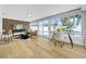 Bright living space with view to backyard pool, desk and seating area at 8001 13Th S Ave, St Petersburg, FL 33707