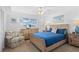 Comfortable bedroom with a large bed and a sitting chair at 915 Beach Rd # 321, Sarasota, FL 34242