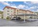 Complex exterior showing parking and building at 915 Beach Rd # 321, Sarasota, FL 34242