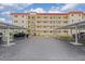 Complex exterior showing parking and building at 915 Beach Rd # 321, Sarasota, FL 34242