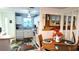 Charming kitchen and dining area featuring white cabinets, modern appliances, and stylish decor for a welcoming atmosphere at 915 Beach Rd # 321, Sarasota, FL 34242