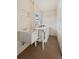 Clean laundry room with a sink and a washing machine at 915 Beach Rd # 321, Sarasota, FL 34242