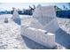 Unique sand sculpture on Siesta Key with a 'Happy Holidays' message at 915 Beach Rd # 321, Sarasota, FL 34242