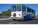Breeze public transportation vehicle on a sunny day with blue skies in the background at 915 Beach Rd # 321, Sarasota, FL 34242