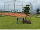 Community baseball field with fencing and sign, perfect for sports and outdoor activities at 9291 Starry Night Ave, Sarasota, FL 34241