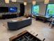 Well-designed game room featuring a foosball table and cozy seating area at 9291 Starry Night Ave, Sarasota, FL 34241