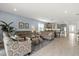 Bright living room with view of kitchen and open floor plan at 9291 Starry Night Ave, Sarasota, FL 34241