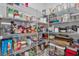 Walk-in pantry featuring ample shelving space for organized storage at 9291 Starry Night Ave, Sarasota, FL 34241