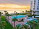 Aerial showcasing oceanfront condos with pool, shuffleboard, hot tub and beach access at 1000 Longboat Club Road # 1105, Longboat Key, FL 34228