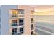 Exterior view of condos with beachside balconies and incredible ocean views at 1000 Longboat Club Road # 1105, Longboat Key, FL 34228