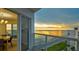 Enjoy the sunrise views from this condo's spacious balcony overlooking the beach and Gulf of Mexico at 1000 Longboat Club Road # 1105, Longboat Key, FL 34228