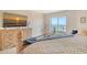 Serene bedroom with ocean view balcony, soft lighting, and stylish furnishings at 1000 Longboat Club Road # 1105, Longboat Key, FL 34228