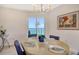 This light filled dining room features views of the ocean and seating for four at 1000 Longboat Club Road # 1105, Longboat Key, FL 34228