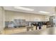 Well-equipped kitchen with stainless appliances, backsplash, and ample counter space for cooking at 1000 Longboat Club Road # 1105, Longboat Key, FL 34228
