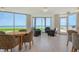 Bright lounge area features gulf views, comfortable seating, and a relaxing atmosphere for residents at 1000 Longboat Club Road # 1105, Longboat Key, FL 34228