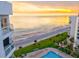 Beautiful view of the ocean and beach from the building with green space at 1000 Longboat Club Road # 1105, Longboat Key, FL 34228