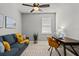 Comfortable office space with a cozy couch, natural light, and modern decor for a productive work environment at 11550 Blackfin St, Venice, FL 34292