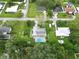 Aerial shot of a home with screened pool and well-maintained landscaping at 1208 Francis Ave, Sarasota, FL 34232